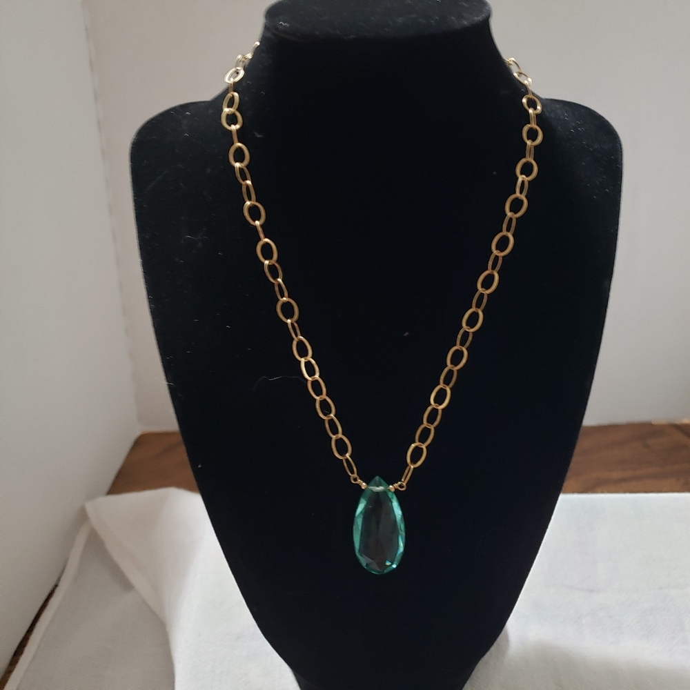 Beautiful gold chain and light blue glass Pendant